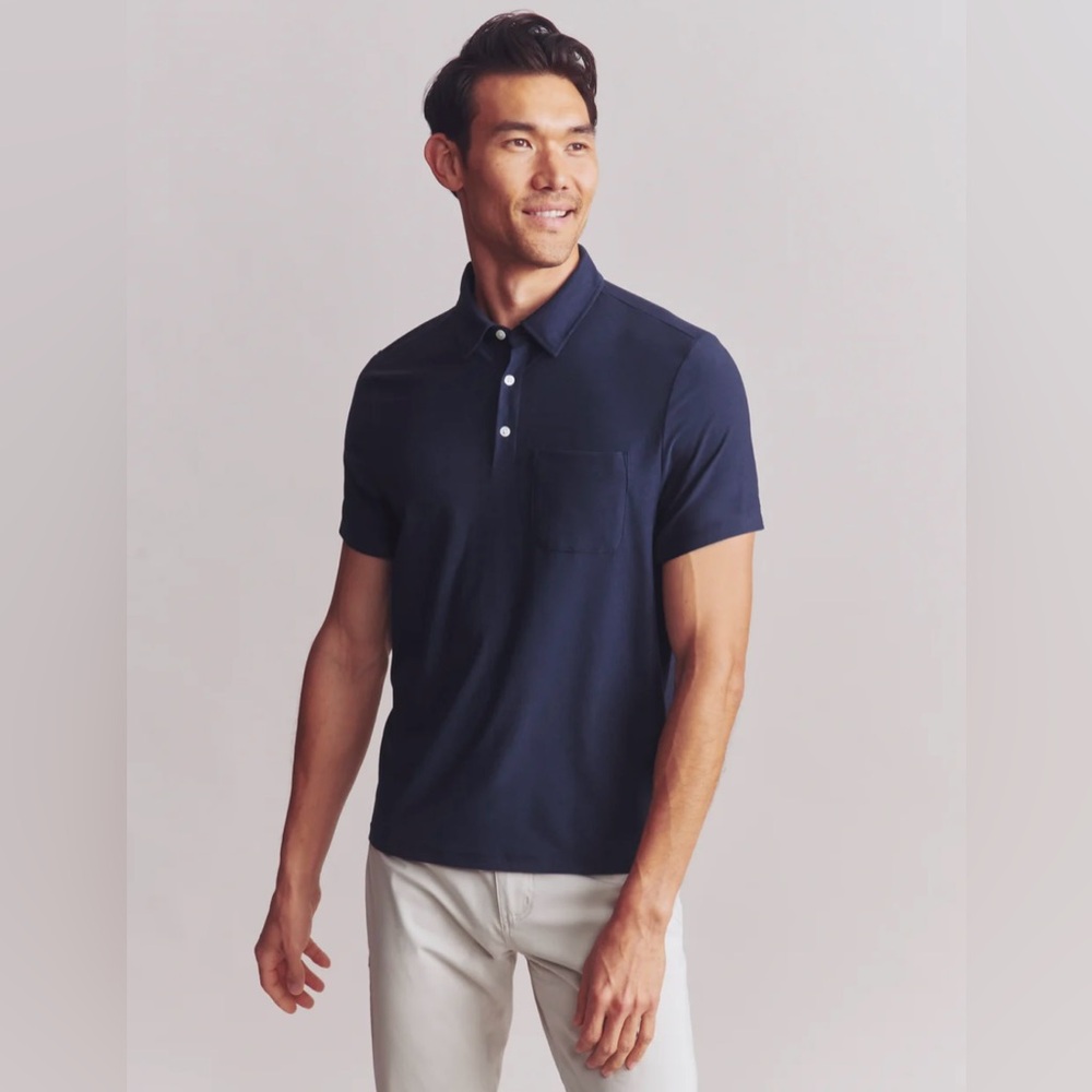 RHONE WFH Polo. Navy Heather color. Size XL. Perfect condition. Never been worn
